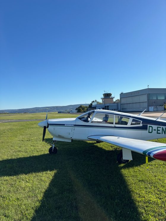 Piper PA28R-200 D-ENBL in front of the hangar at Bayreuth-Bindlach airfield